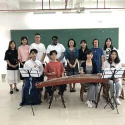 Photo of Han Ye, Ph.D., assistant professor of Chinese at W&J, in a classroom with her students.