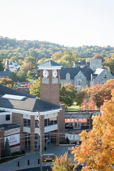 The clock tower at Rossin Campus Center as seen with the Technology Center in the background October 21, 2019 during the Creosote Affects photo shoot at Washington & Jefferson College.